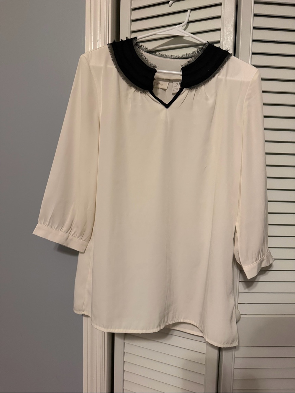 Chico's Cream Blouse with Black Trim Collar